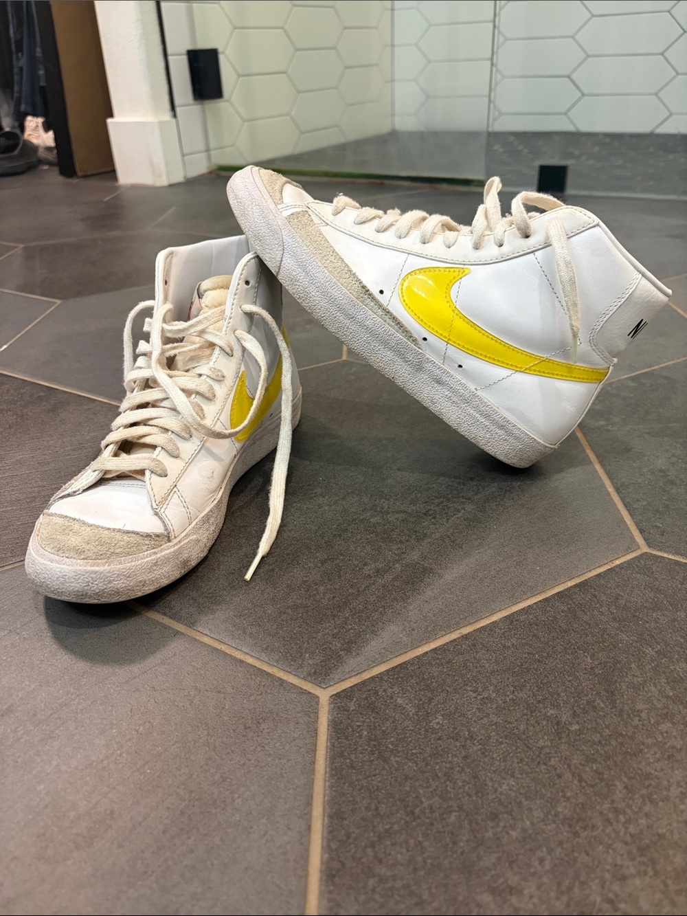 Nike Kids White High-Top Sneakers with Yellow Swoosh Accent